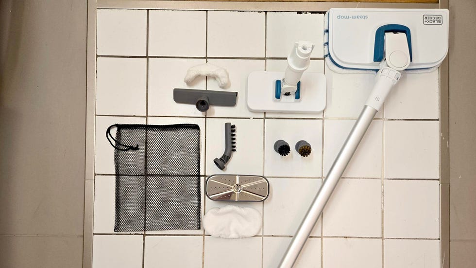 Best Steam Mops: Black+Decker Steam Cleaning System black and decker on a tile floor next to its various attachments