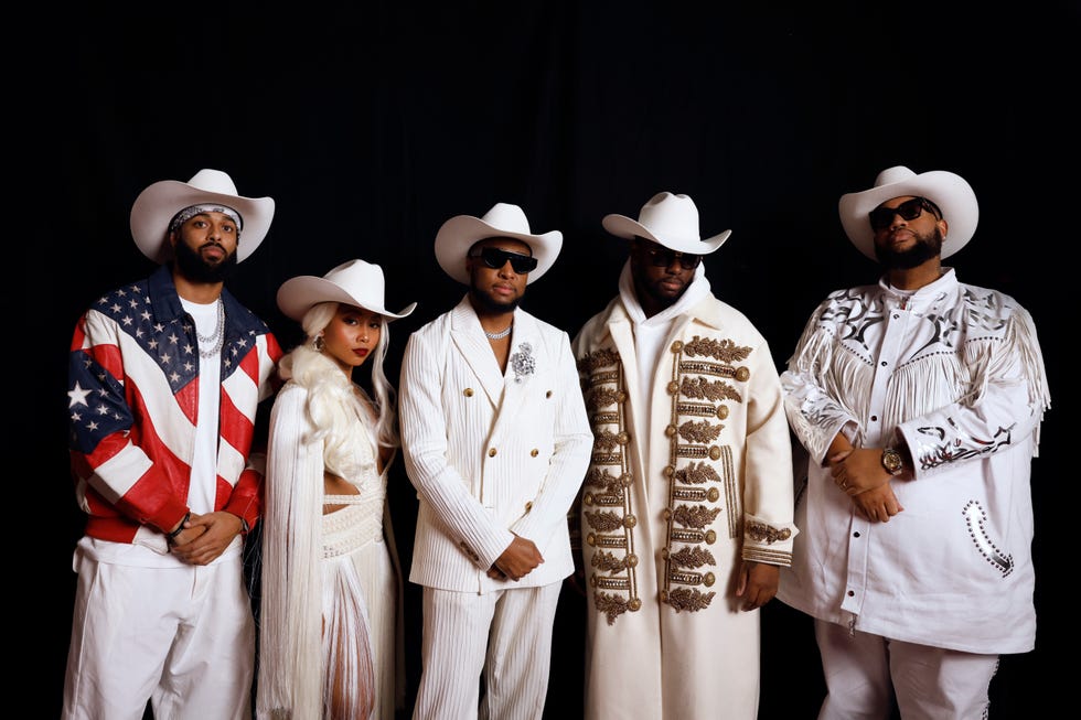 group of individuals dressed in distinct westernthemed outfits