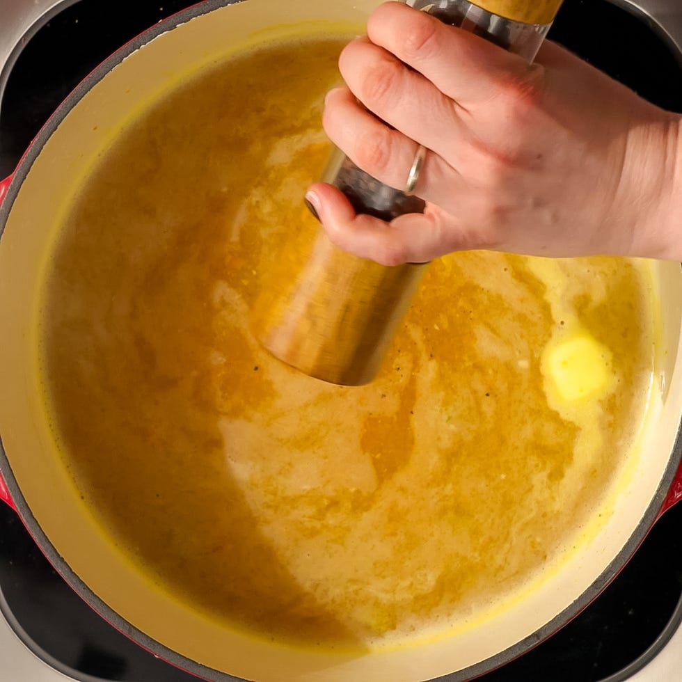 cooking process of mixing ingredients in a pot
