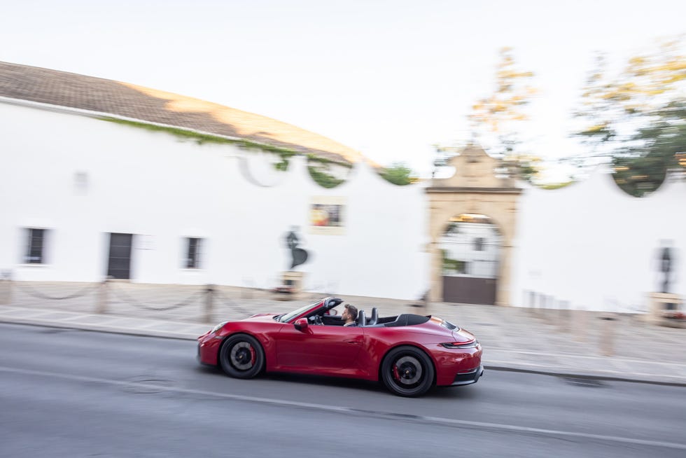 2025 Porsche 911 driving through city