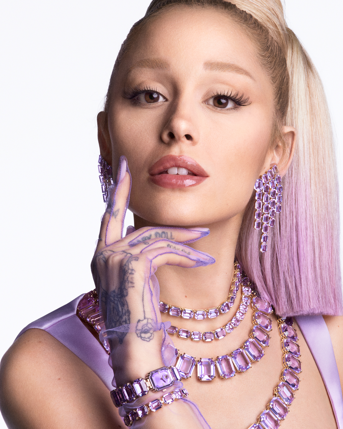 The singer broke her signature ponytail back for Swarovski's campaign—but with a surprise twist.