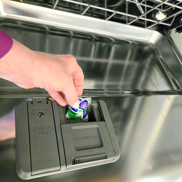 Best Dishwasher Tablets - Inserting a dishwasher pack into the dispenser best dishwasher tablets inserting a dishwasher pack into the dispenser