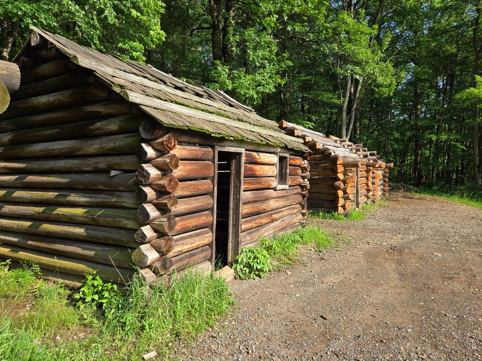 a trio of wood cabins