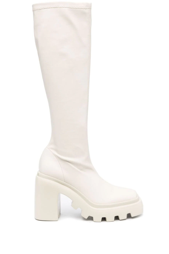 a white high heeled shoe