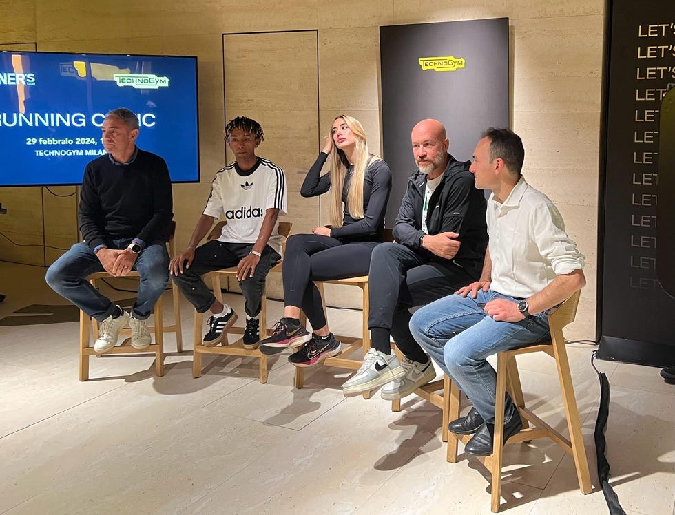 a group of people sitting in chairs