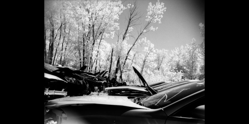 infrared film photographs in wisconsin car graveyard