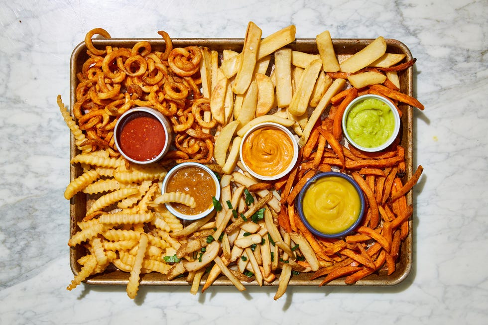 french fry board with condiments