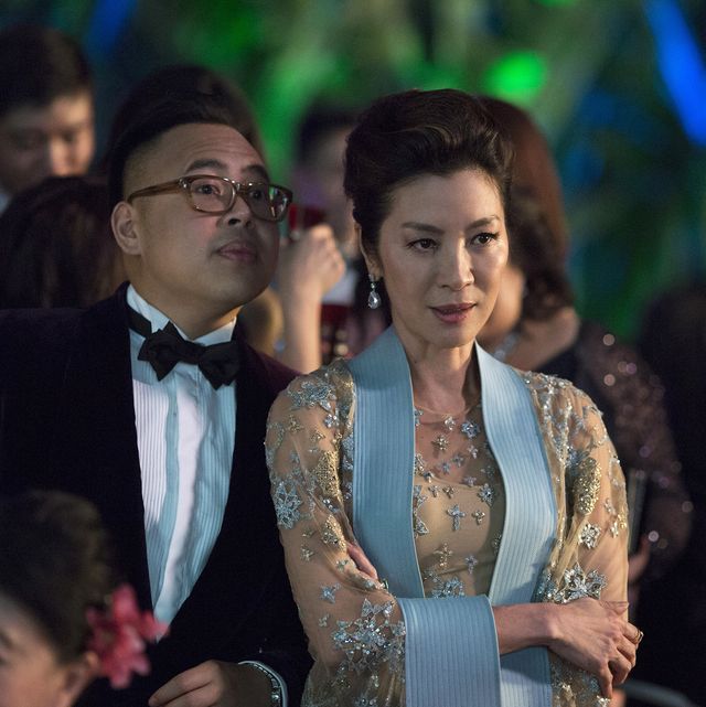 nico santos as oliver and michelle yeoh as eleanor in "crazy rich asians"