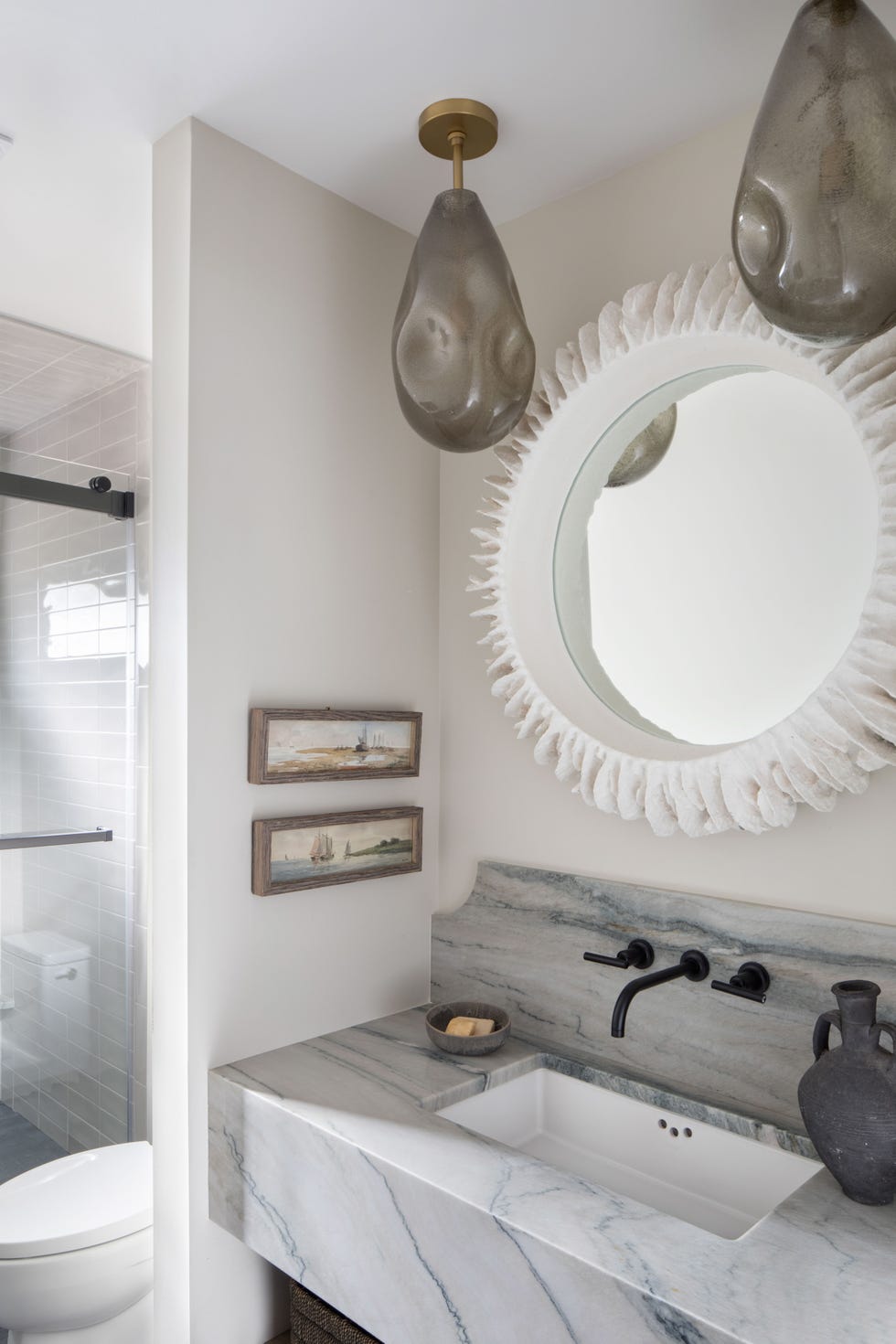 a bathroom with a large mirror