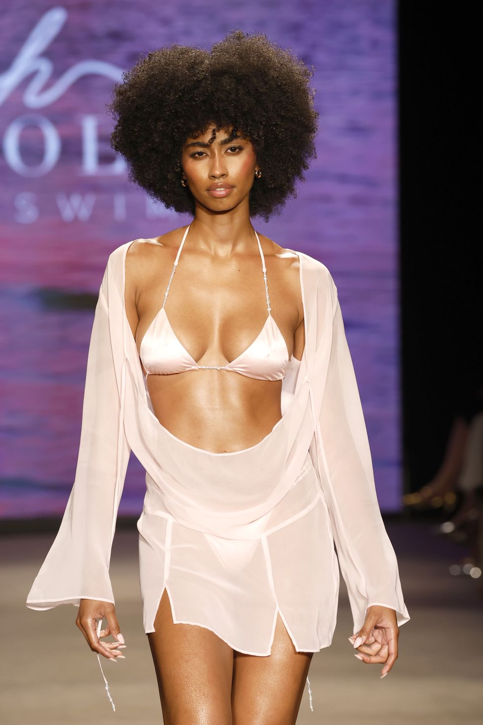 miami beach, florida may 31 a model walks the runway for oh polly swim fashion show during paraiso miami swim week at the paraiso tent on may 31, 2024 in miami beach, florida photo by frazer harrisongetty images for paraiso miami beach