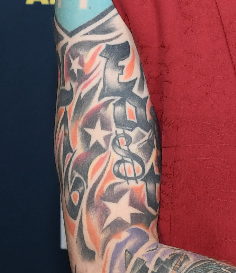 Machine Gun Kelly Gets Jarring New Slashed Neck Tattoo | Access