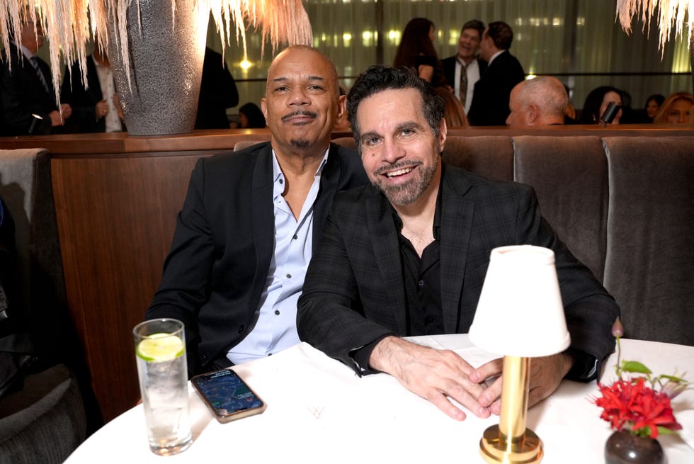 new york, new york december 11 mario cantone r and guest attend esquires 2024 best new restaurants in america celebration x four twenty fives one year anniversary at four twenty five on december 11, 2024 in new york city photo by sean zannigetty images for hearst magazines