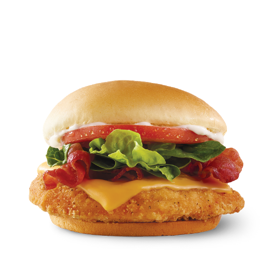 a cheeseburger with lettuce tomato and cheese