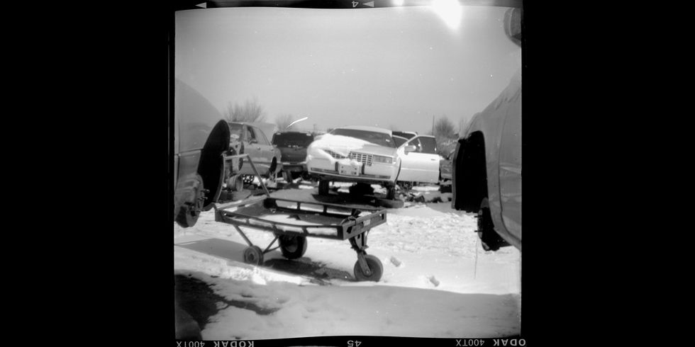 junkyard cars photographed with imperial savoy film camera