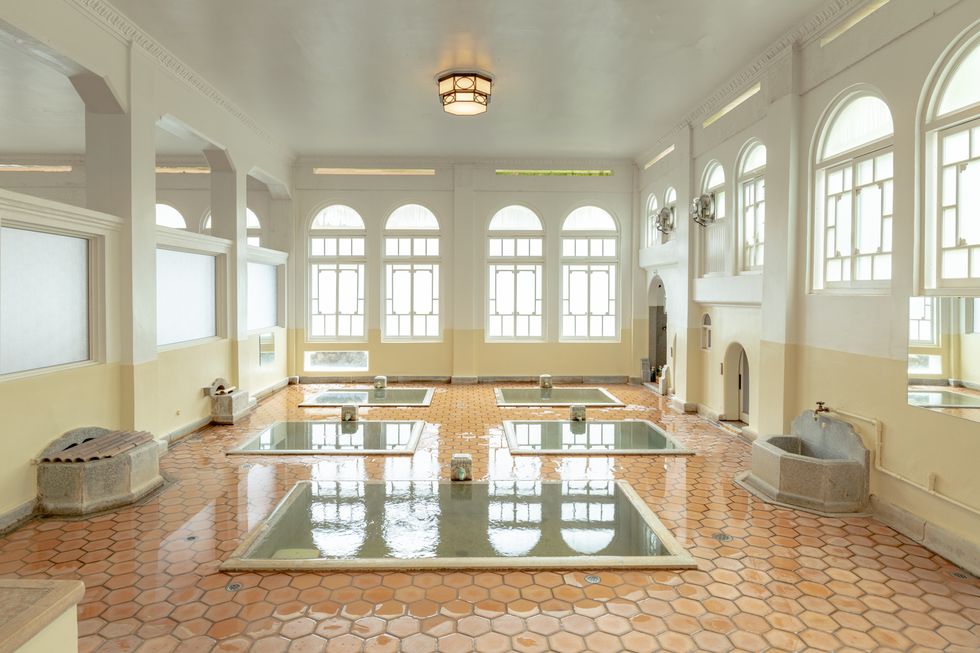 a large room with a large pool
