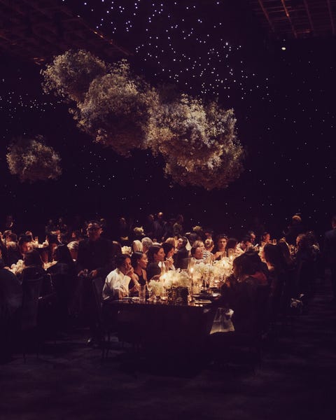guests dining at chanel dinner to celebrate the 1932 high jewelry collection