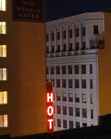 window, facade, architecture, building, amber, wall, urban area, landmark, real estate, fixture,