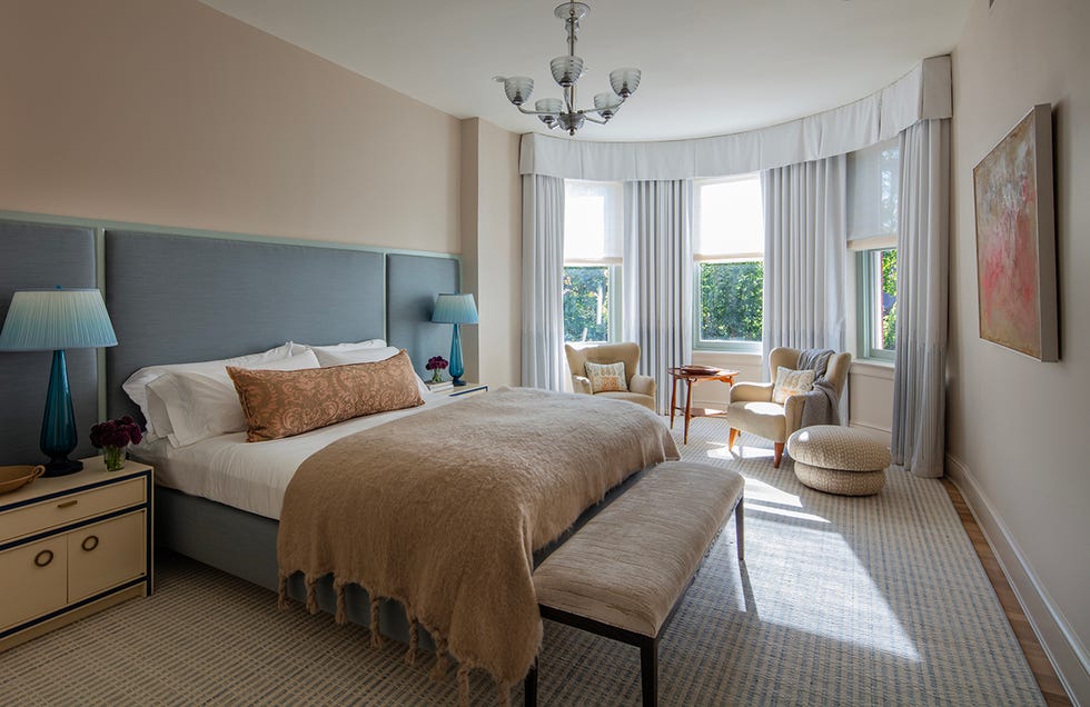 bedroom featuring a bed seating area and natural light from windows