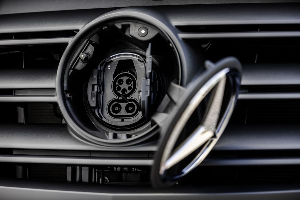 benz grille star opening to show charge port