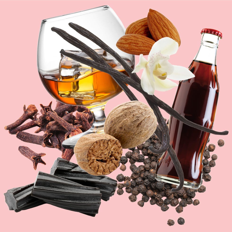 a bottle of alcohol and a pile of cloves of cloves