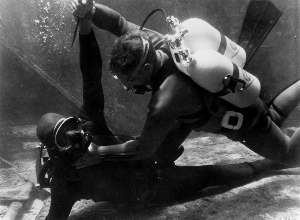 two unknown actors fighting in scuba gear under water in a scene from the film 'thunderball', 1965 photo by united artistsgetty images