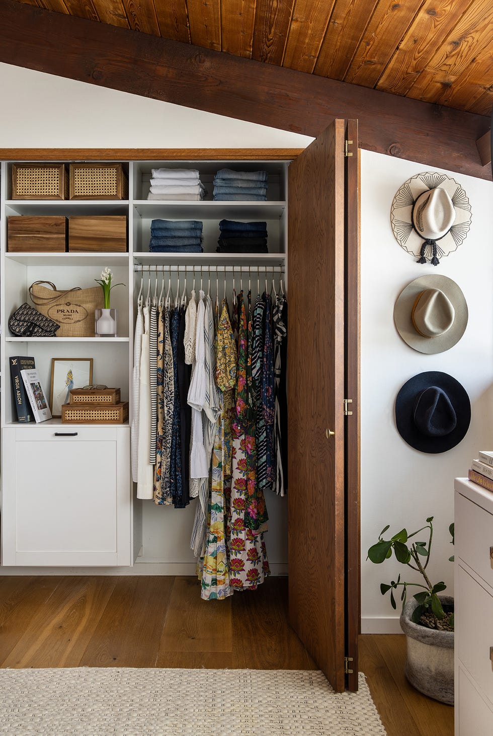 organized closet with wood doors