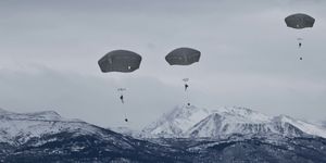 paratroopers with the 3rd battalion airborne, 509th infantry regiment, 4th infantry brigade combat team airborne, 25th infantry division, parachute onto malamute drop zone after exiting a uh 60 black hawk on joint base elmendorf richardson, alaska, nov 24, 2015 army photo by staff sgt brian ragin