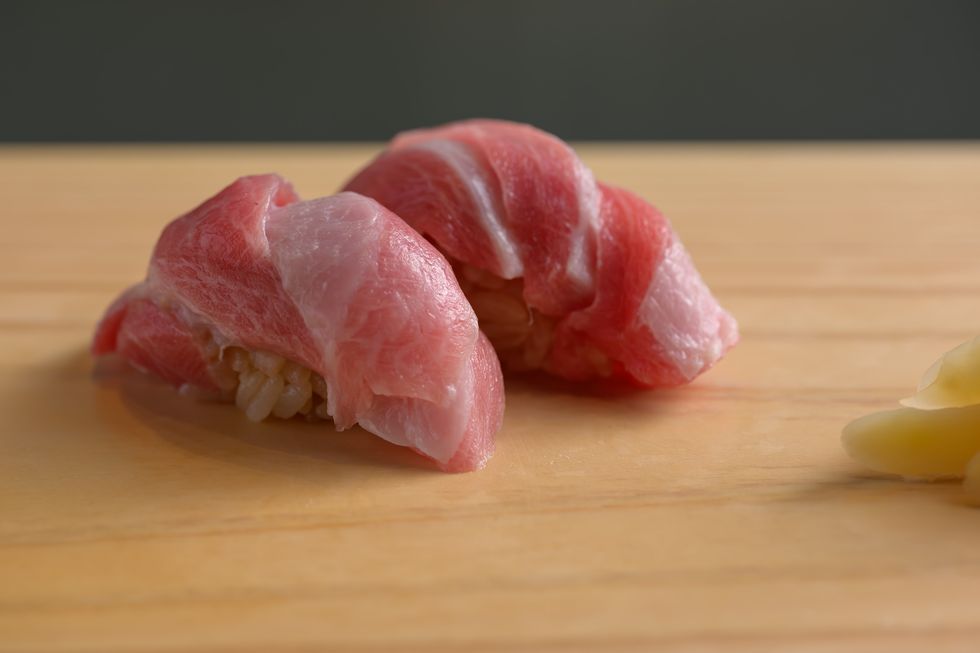 a piece of raw meat on a wooden surface