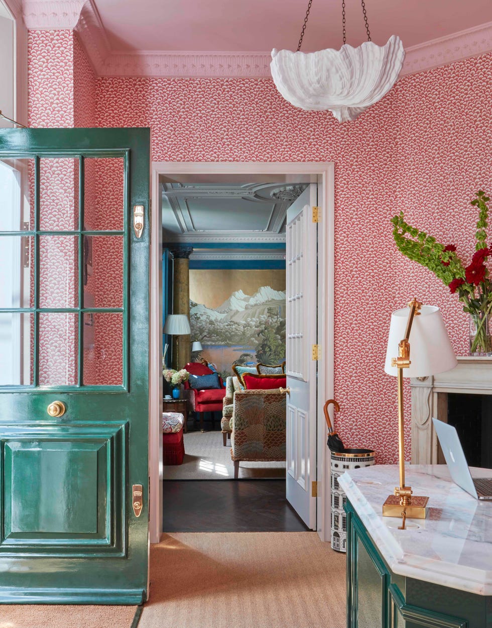 de gournay wallpaper and deisgner seating in the waiting room