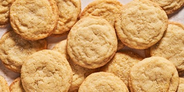 sugar cookies piled together on a counter