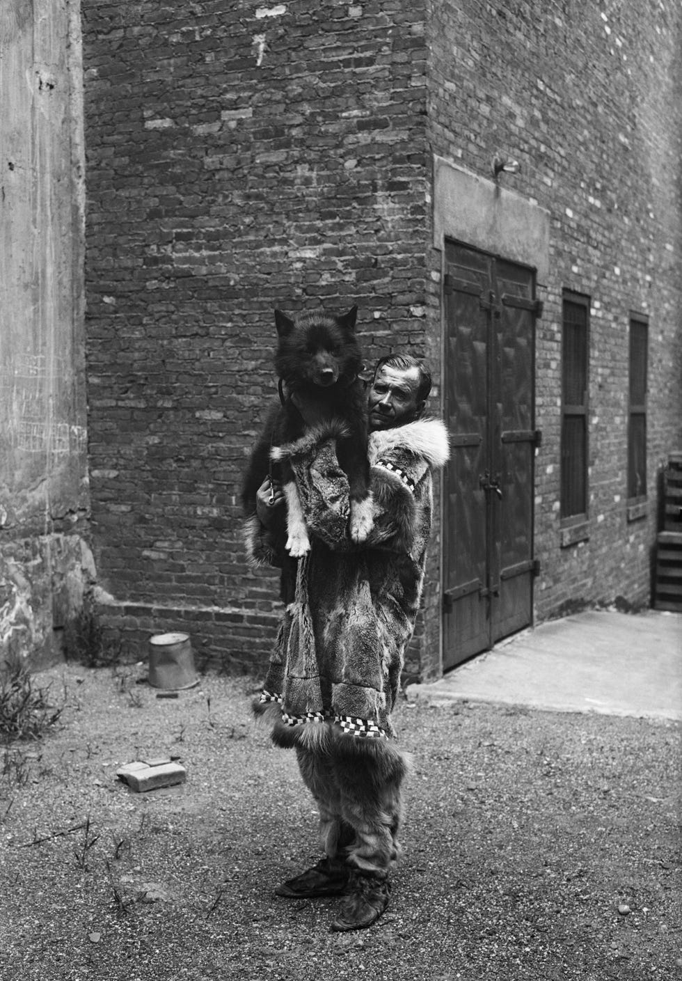 Sledder Holding His Famous Dog Balto