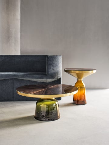 modern living space featuring a gray sofa and decorative tables