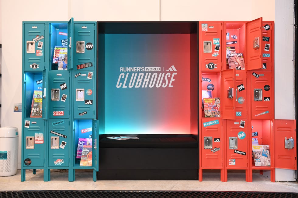 the scene features a collection of lockers in two contrasting colors teal and red each locker has various stickers and photos affixed to it, showcasing themes related to running and fitness inside some of the lockers, magazines and promotional materials are visible, including issues of runner's world a central area behind the lockers displays the runner's world clubhouse logo against a gradient background, creating a lively atmosphere suited for a running community the scene features a collection of lockers in two contrasting colors teal and red each locker has various stickers and photos affixed to it, showcasing themes related to running and fitness inside some of the lockers, magazines and promotional materials are visible, including issues of runner's world a central area behind the lockers displays the runner's world clubhouse logo against a gradient background, creating a lively atmosphere suited for a running community