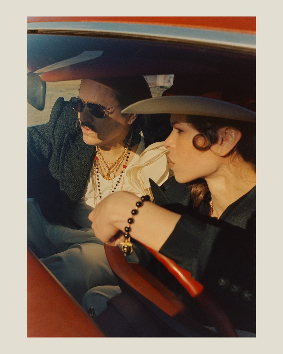 a man and woman in a car