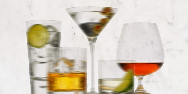 a group of glasses with liquid in them