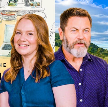 Nick Offerman and Helen Rebanks a man and woman posing for a picture in front of a wall of art