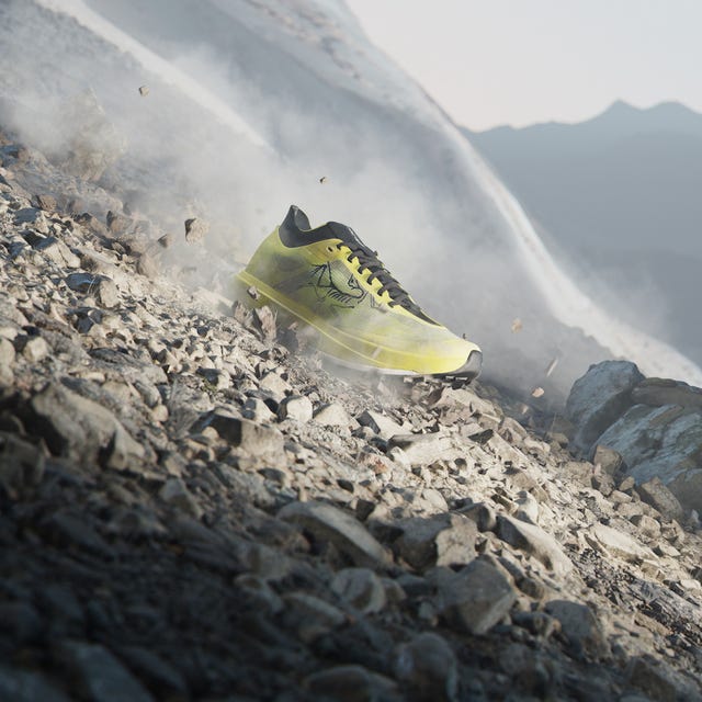 a yellow jet ski on a rocky mountain