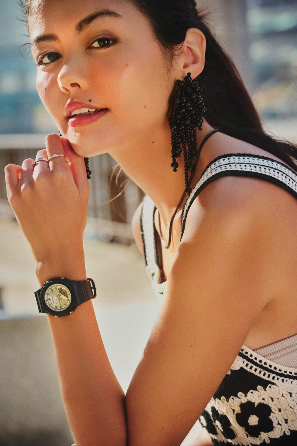 a woman with a watch on