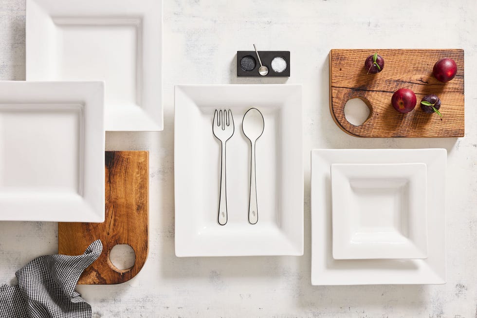 a set of white trays and wooden cutting boards