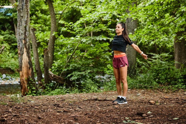 a person standing in a forest