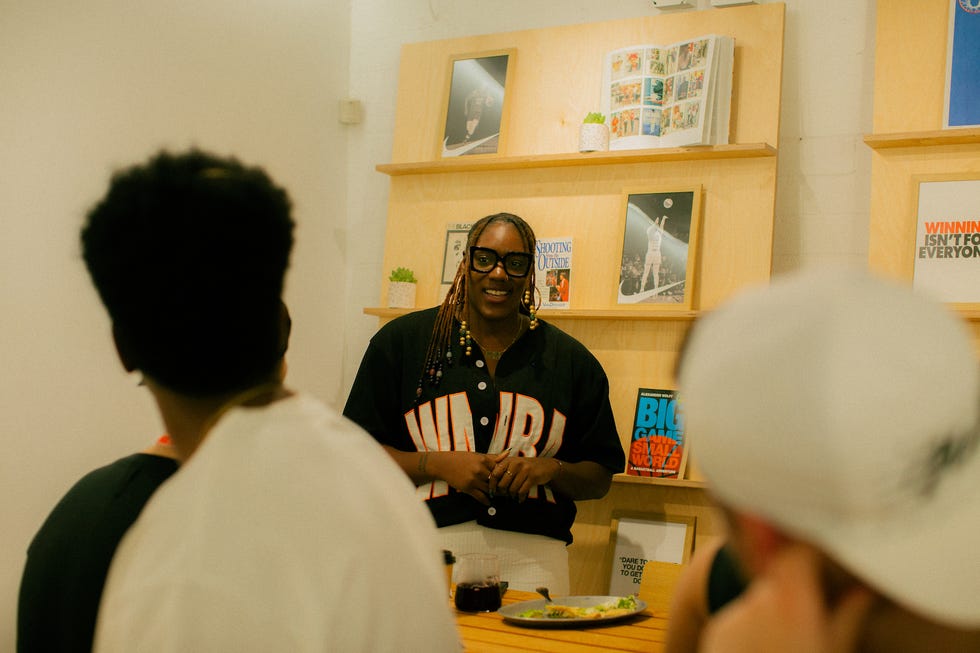 a man talking to a group of people