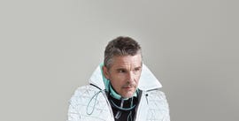 ethan hawke wearing a futuristic outfit with a unique collar design