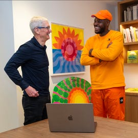 apple ceo tim cook meets artist and designer yinka ilori at christea roberts gallery in mayfair, where some of his works are on display yinka shows how he uses mac to create his work, which includes art, physical objects including chairs, and outdoor installations