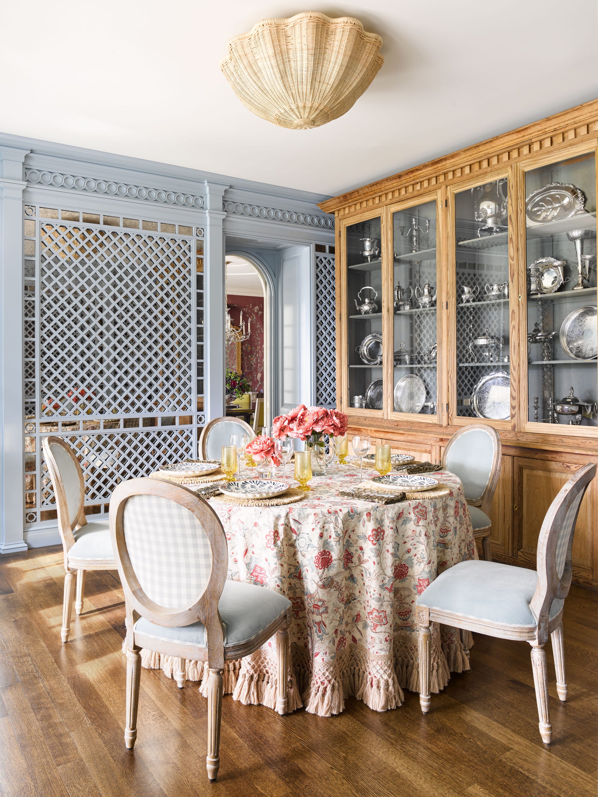 bromley samora st louis home tour breakfast room blue treillage antique china cabinet