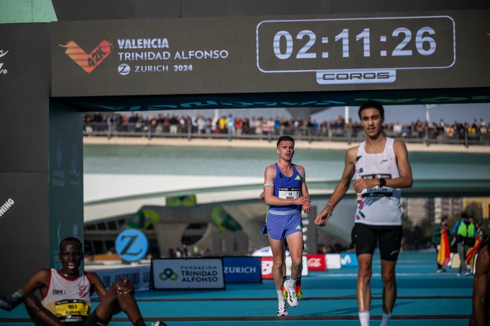 Marathon runners crossing the finish line at an event