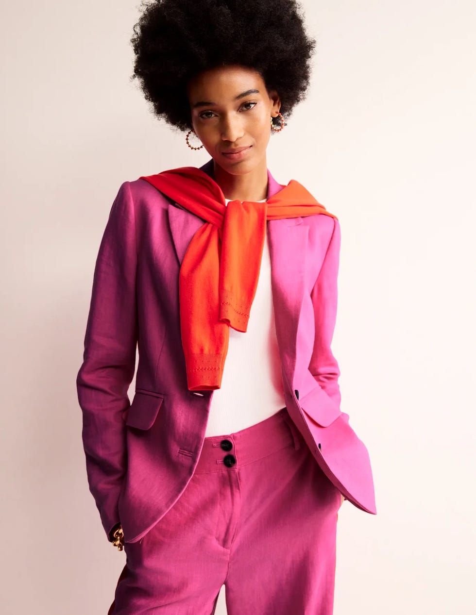 a person in a pink suit