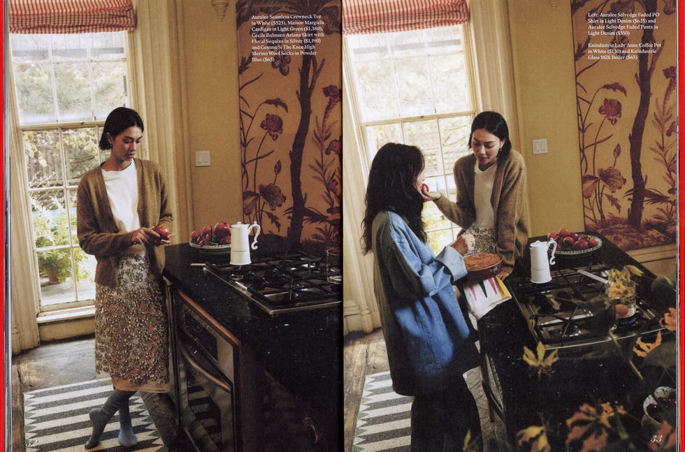 two people interacting in a kitchen setting