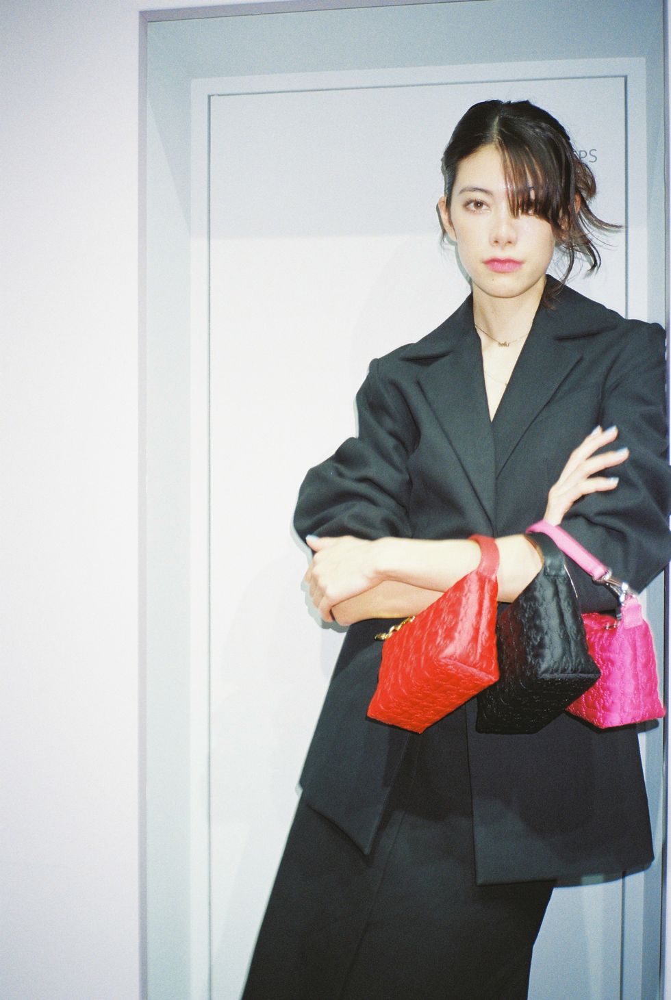 a woman holding a bag