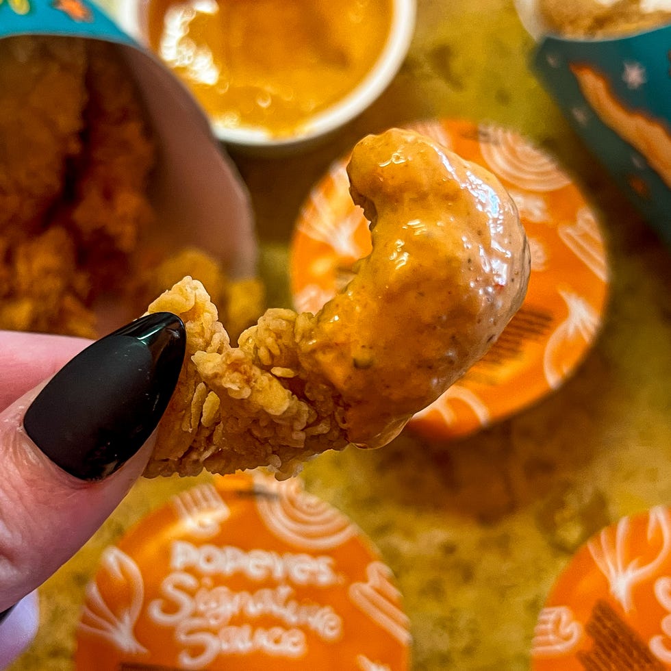 chicken strip dipped in sauce