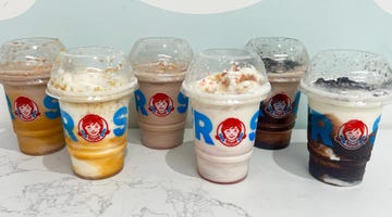 variety of wendys frosty desserts in clear cups